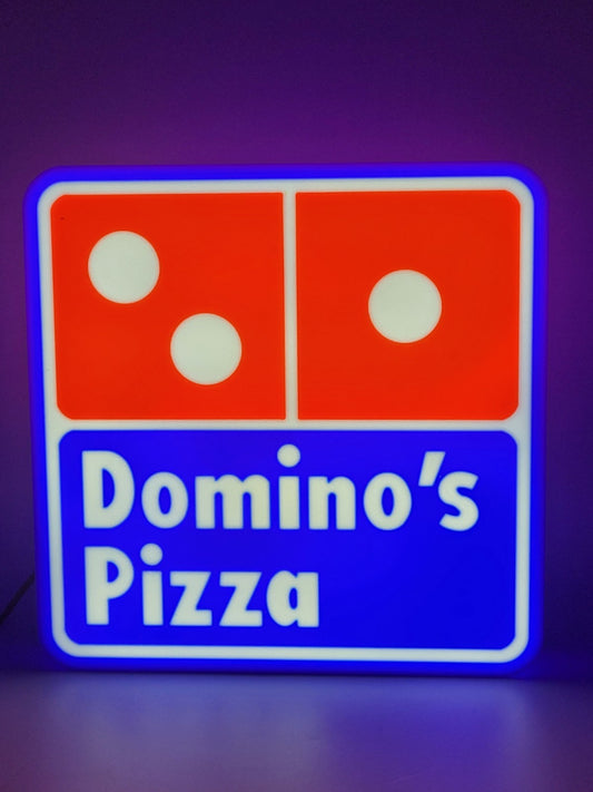 Domino's LED light sign with illuminated logo viewed from straight on