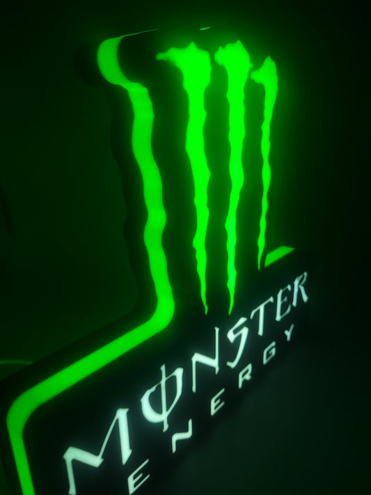 monster LED light sign with illuminated logo viewed from side view