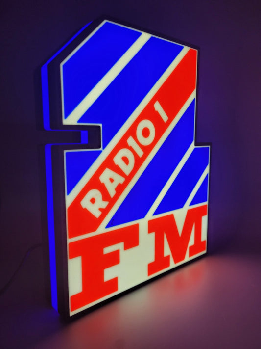 radio 1 led light sign with illuminated logo viewed from side view