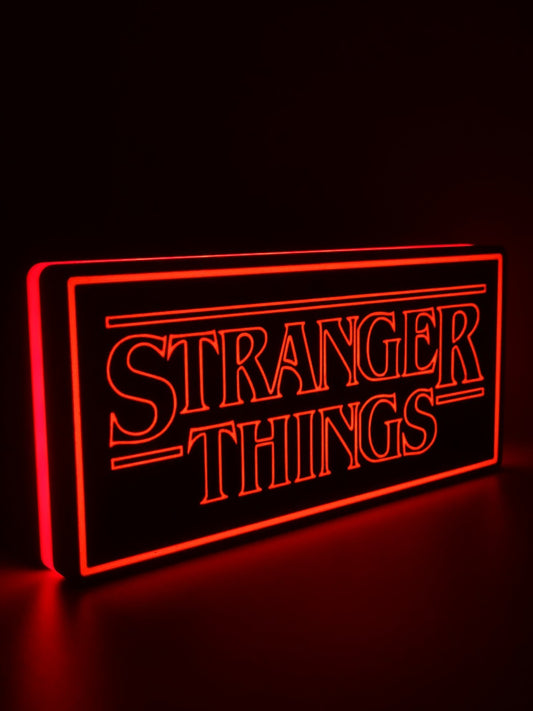 Stranger Things led light sign with illuminated logo viewed from side view