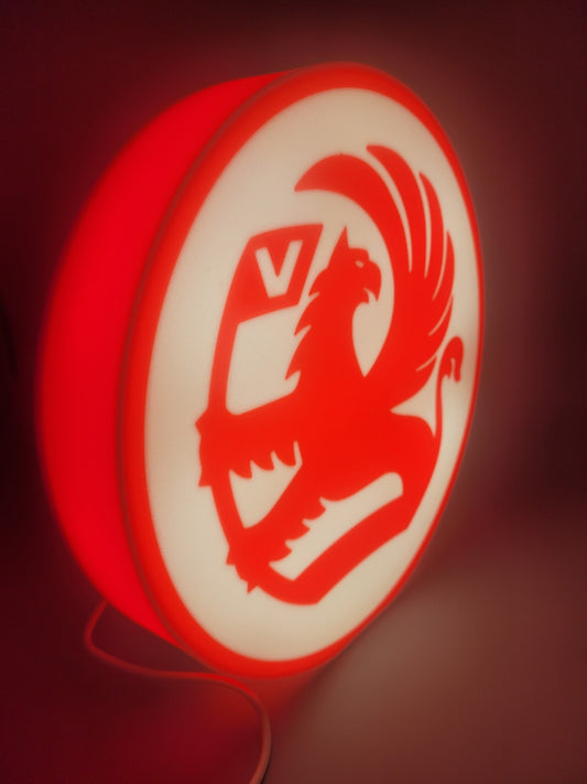 vauxhall LED light sign with illuminated logo viewed from side view