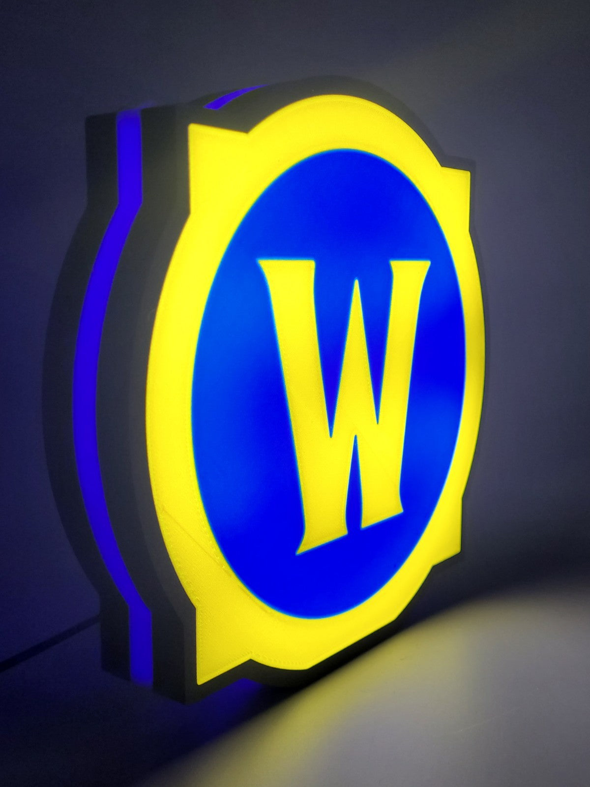 world of warcraft led light sign with illuminated logo viewed from side view