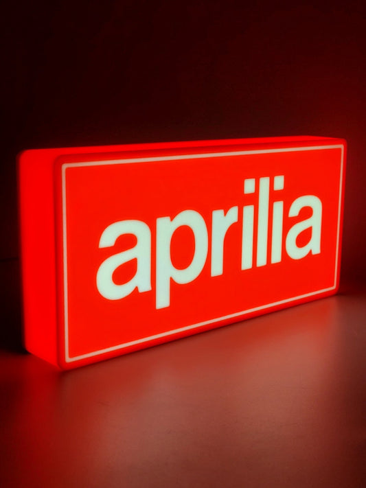 Aprilia led light sign with illuminated logo viewed from side view