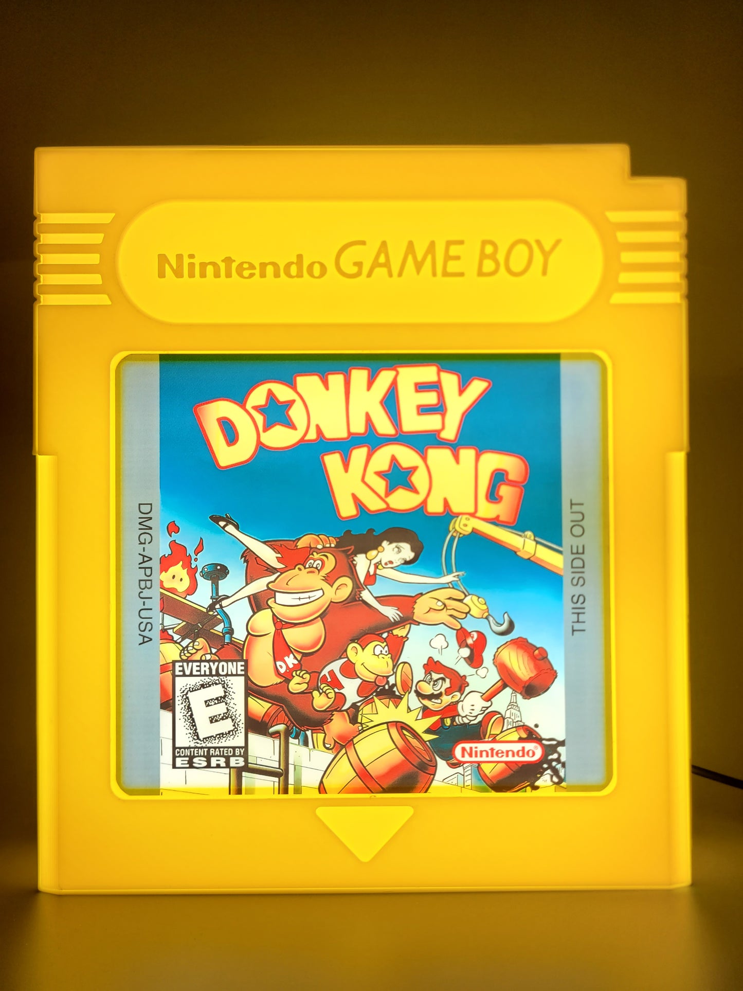 donkey kong gameboy cartridge LED light sign with illuminated logo viewed from straight on