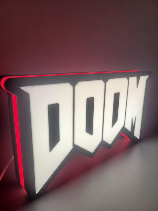 Doom LED light sign with illuminated logo viewed from side view