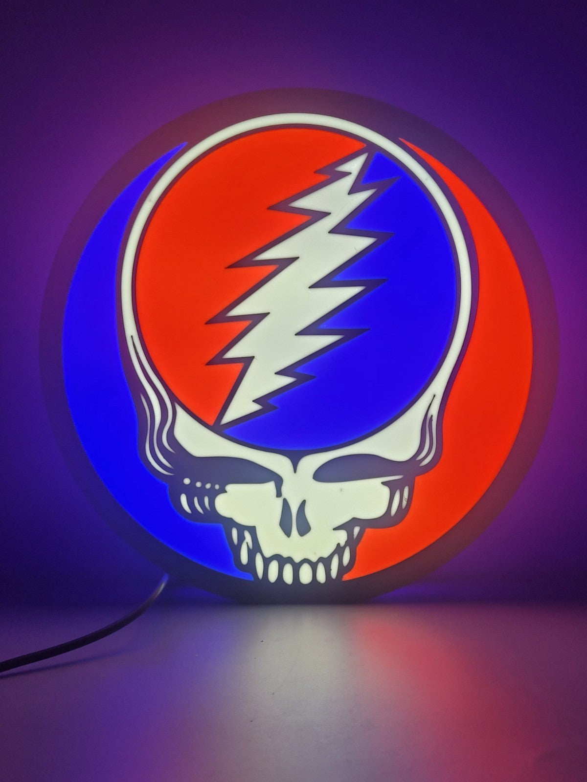 Greatful Dead led light sign with illuminated logo viewed from straight on