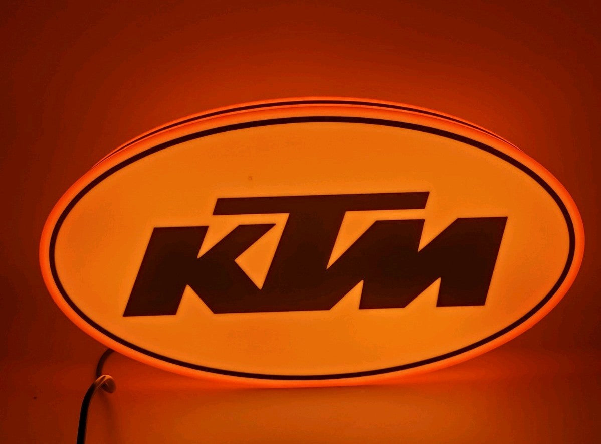 KTM led light sign with illuminated logo viewed from straight on