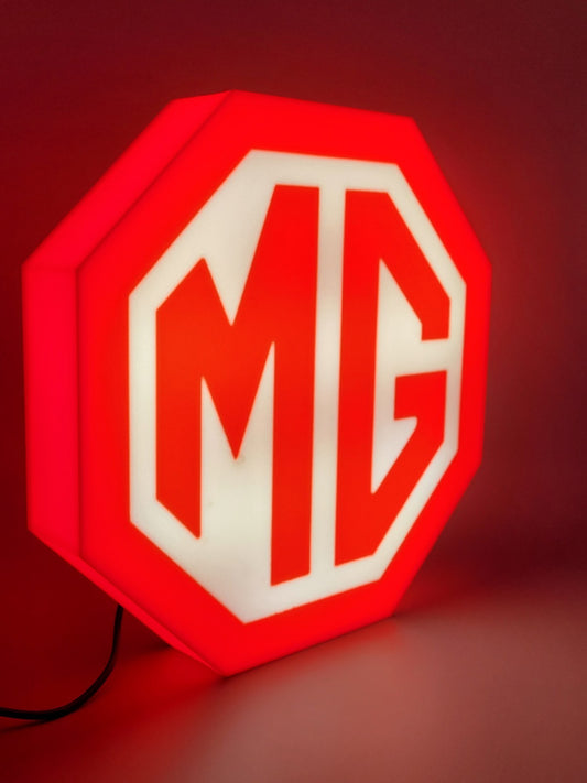 MG led light sign with illuminated logo viewed from side view