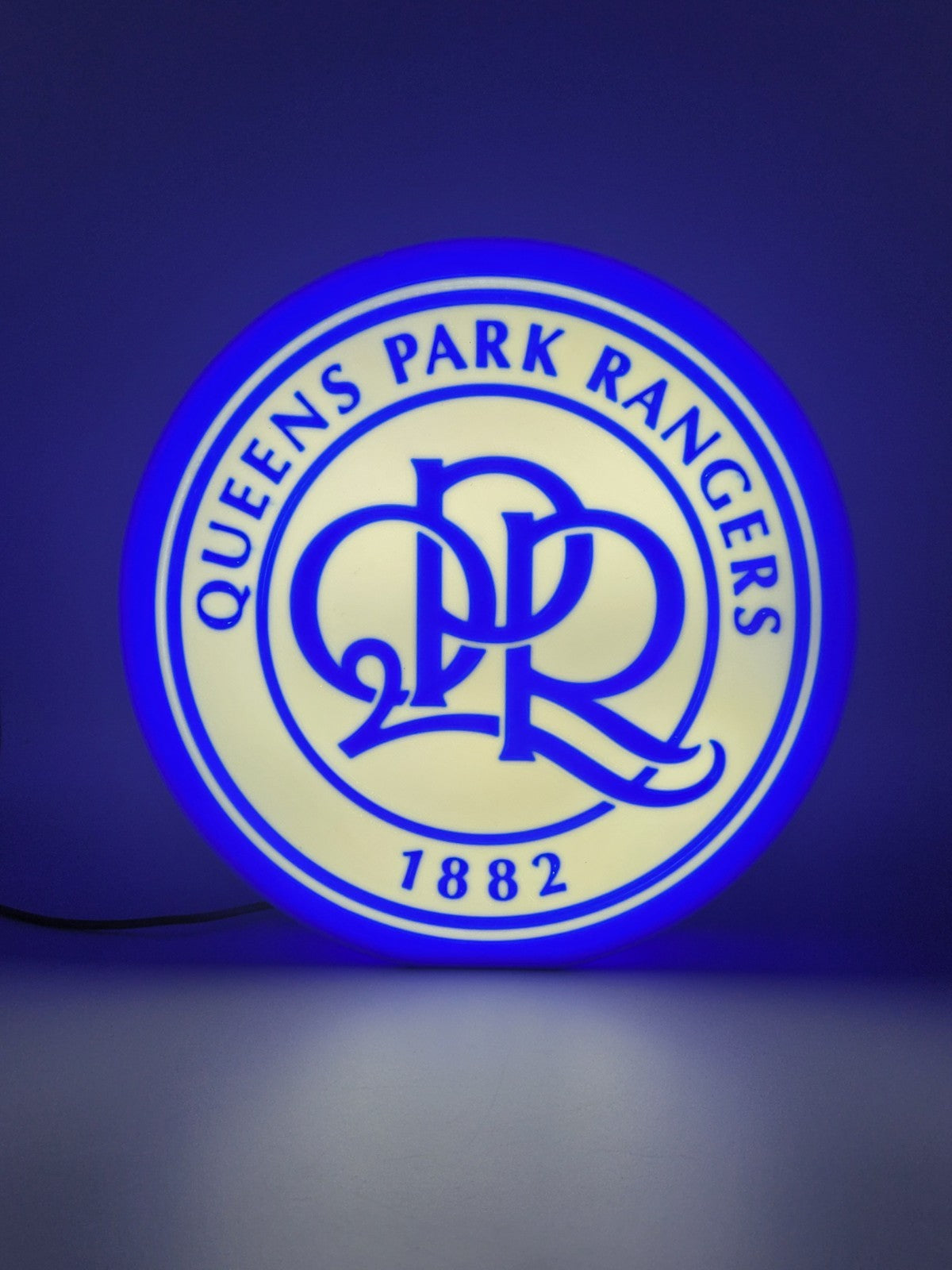 Queens Park Rangers QPR LED light sign with illuminated logo viewed from straight on