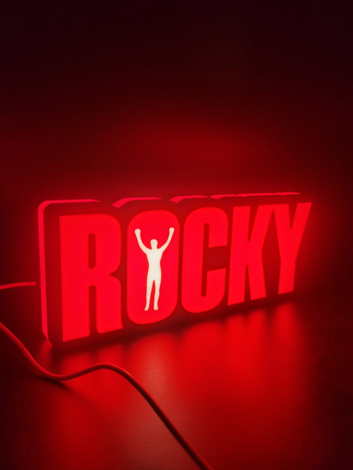 ROCKY led light sign with illuminated logo viewed from side view