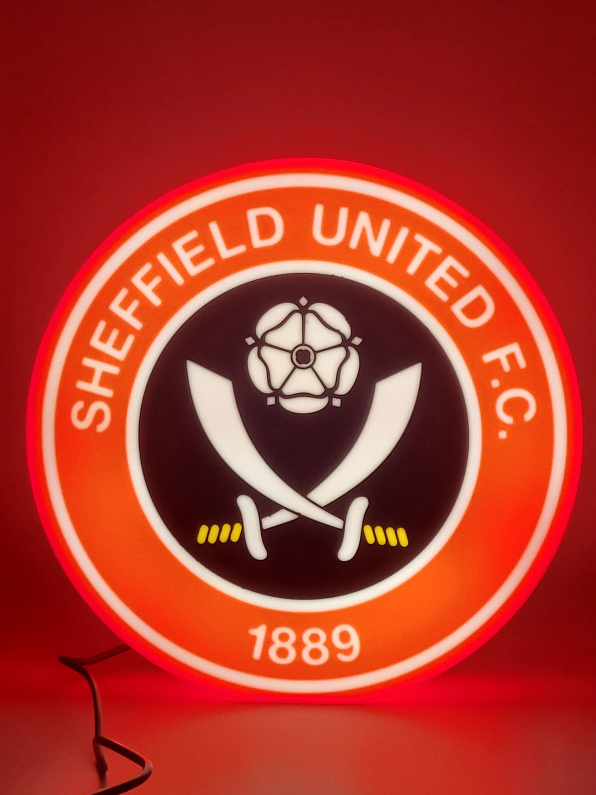 Sheffield United F.C. LED light sign with illuminated logo viewed from straight on