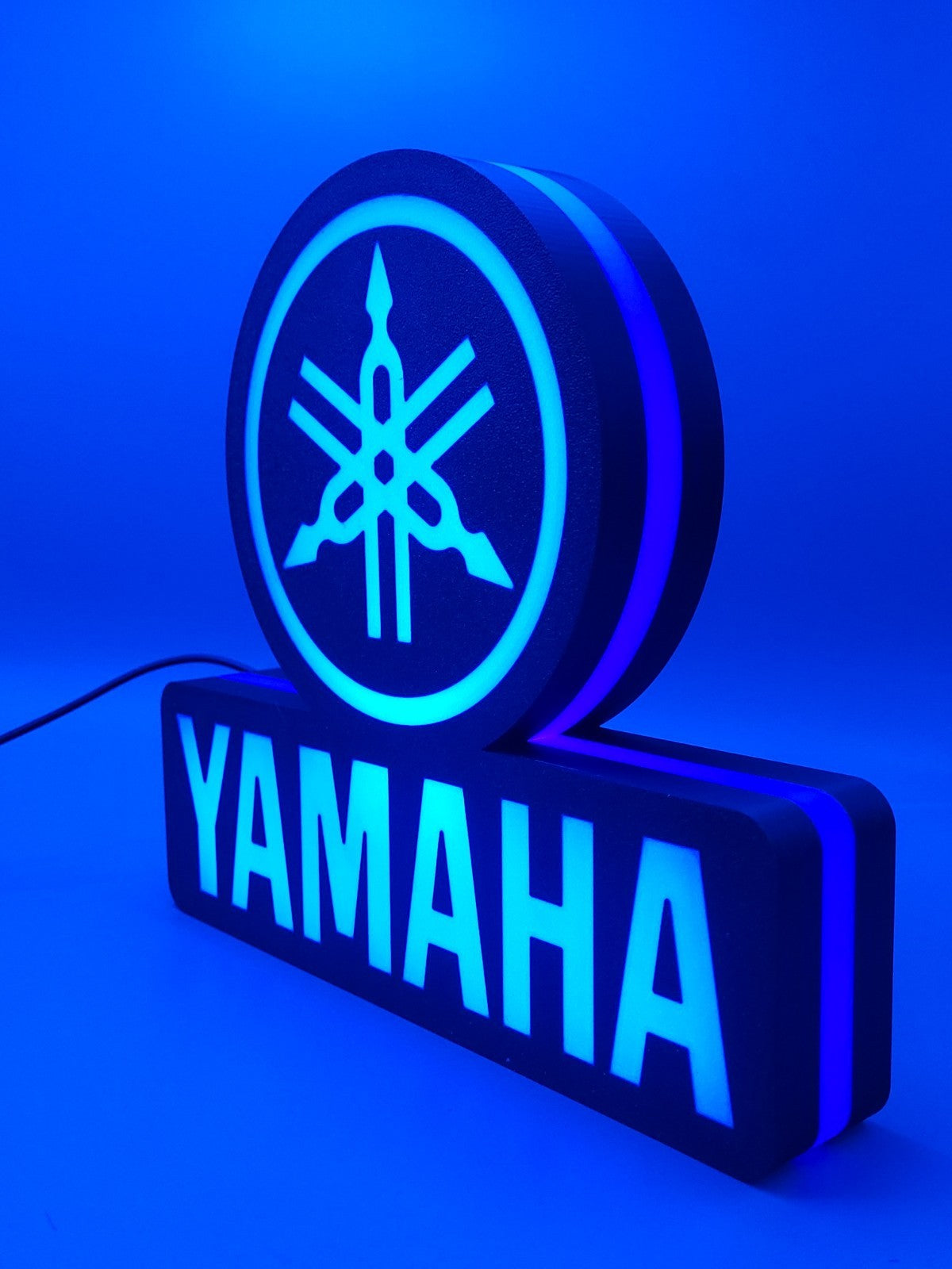 yamaha led light sign with illuminated logo viewed from side view