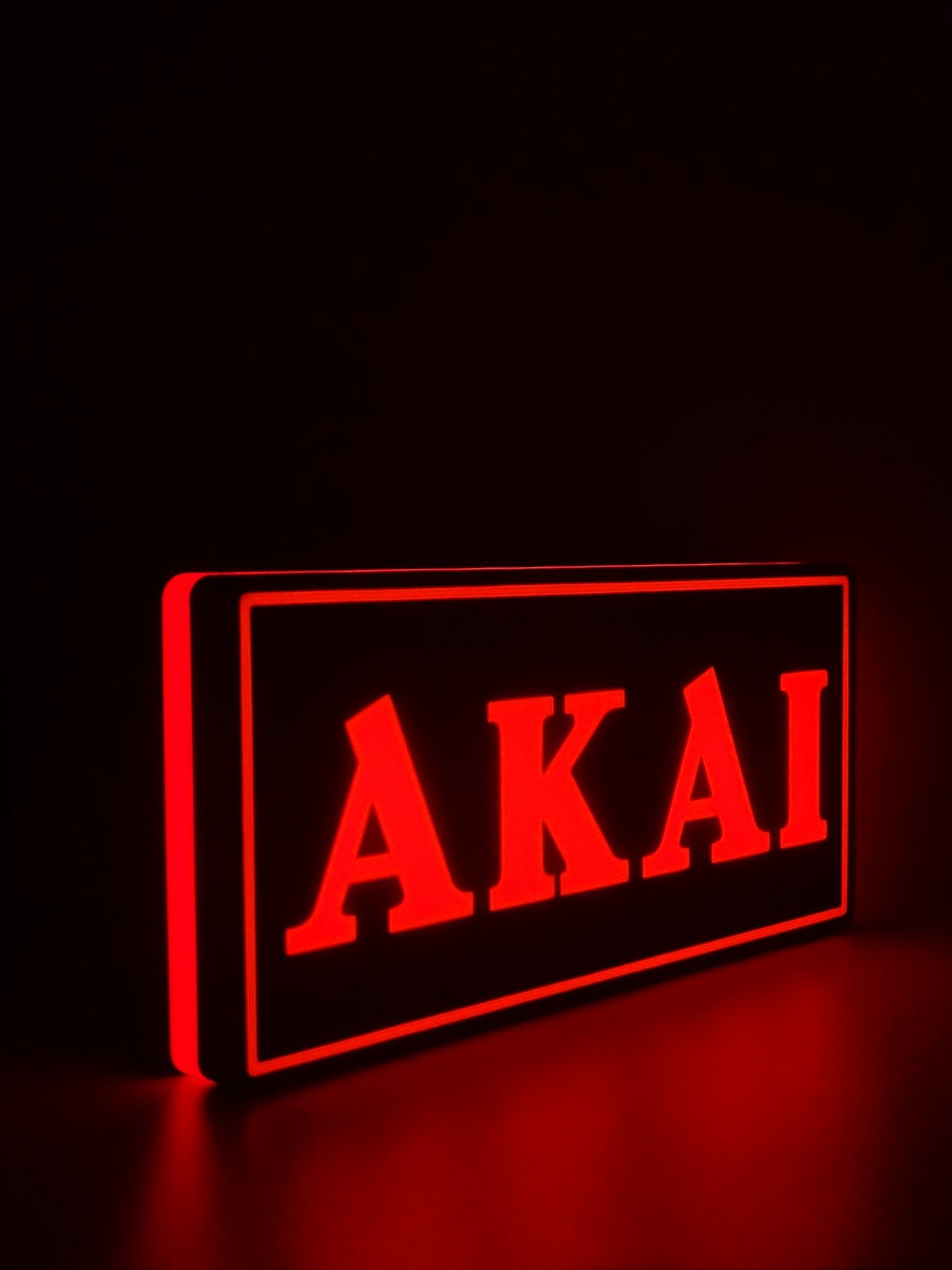 Akai led light sign with illuminated logo viewed from side view 