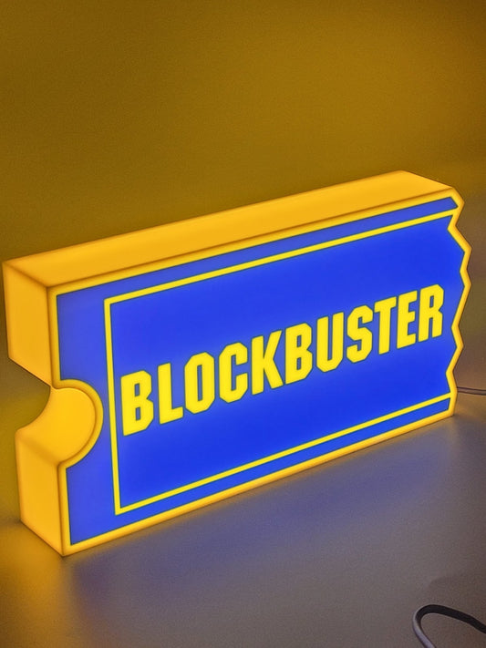 Blockbuster LED light sign with illuminated logo viewed from side view