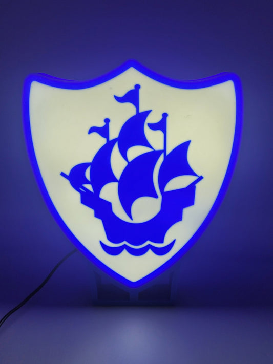 Blue Peter LED light sign with illuminated logo viewed from straight on
