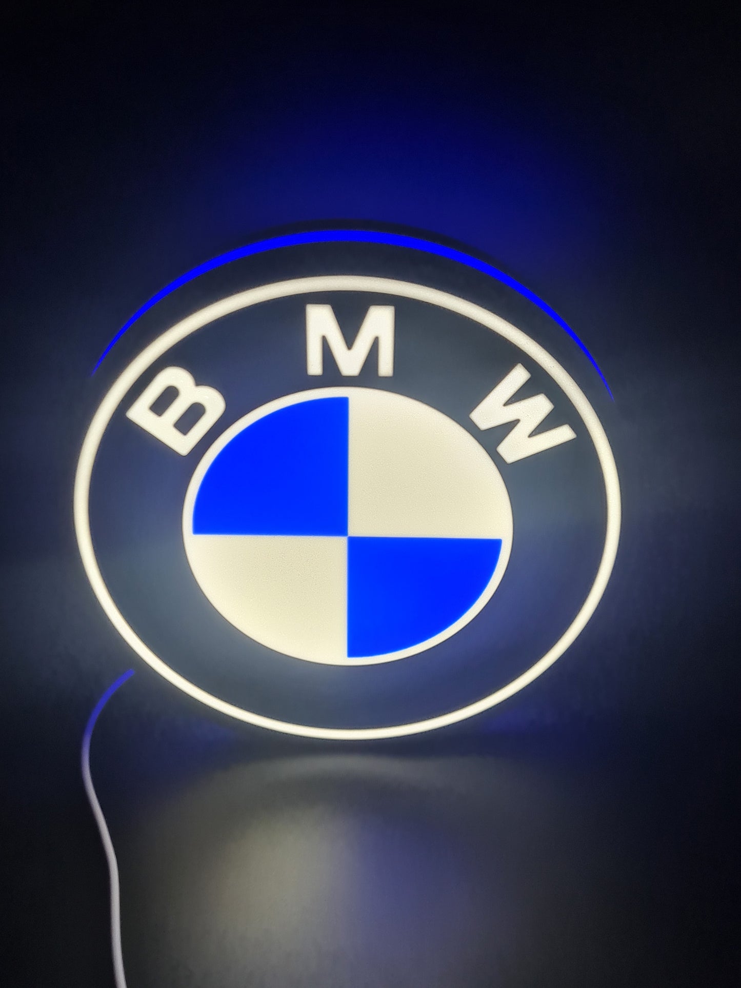 BMW LED light sign with illuminated logo viewed from straight on