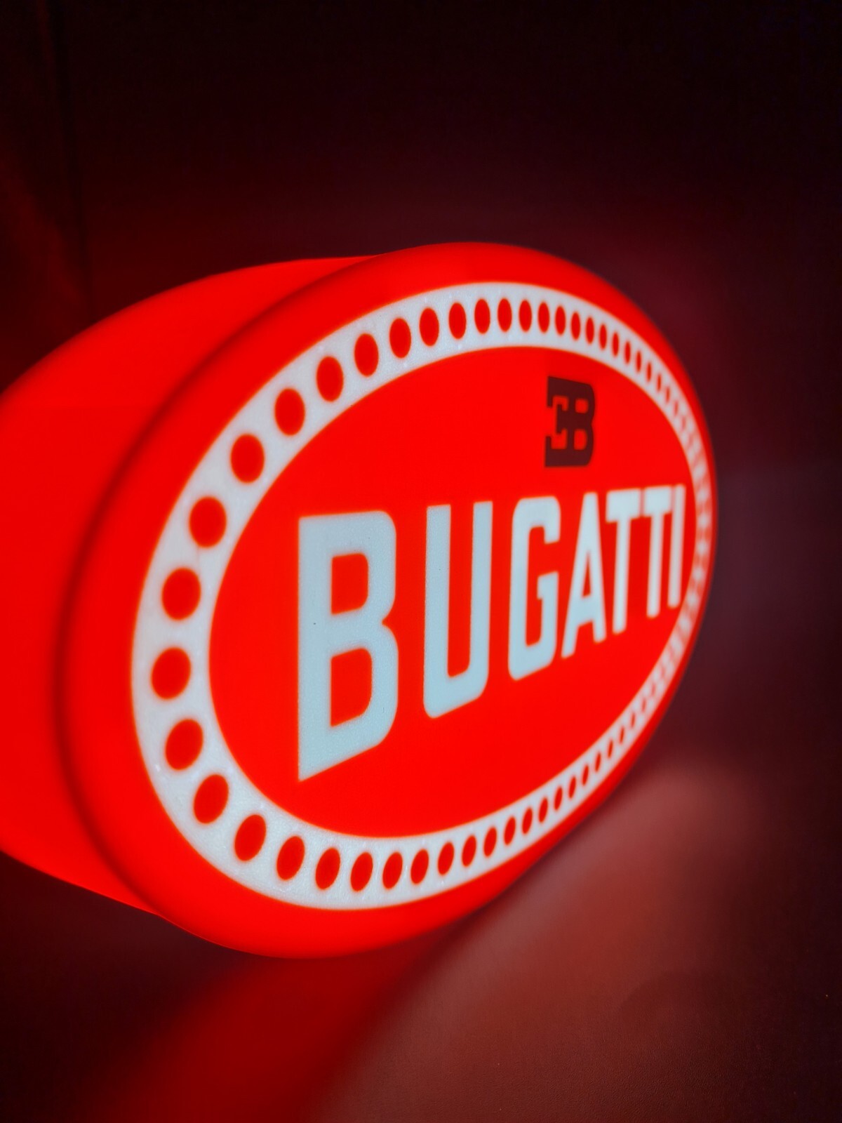 bugatti led light sign with illuminated logo viewed from side view