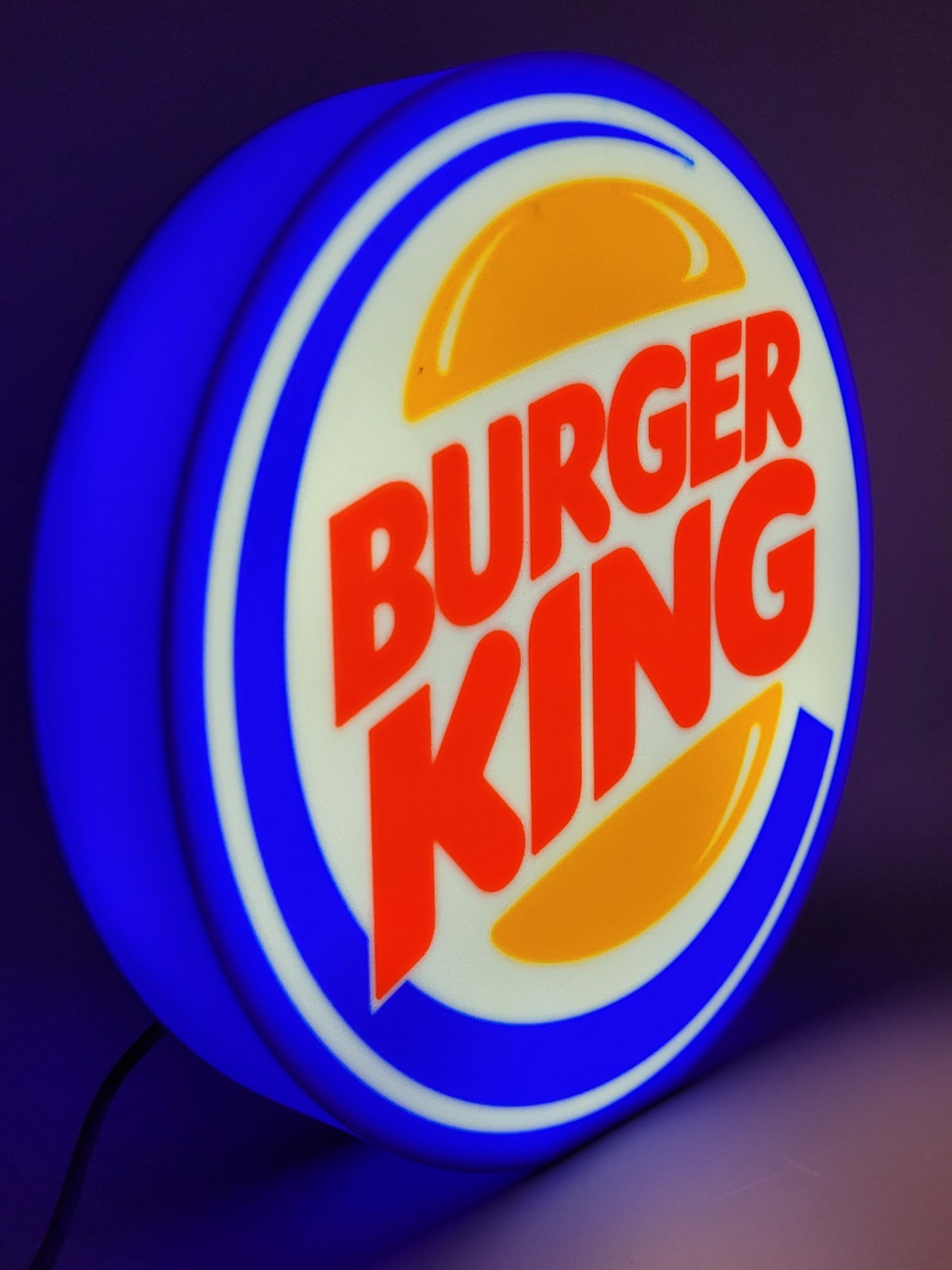 Burger King LED light sign with illuminated logo viewed from side view