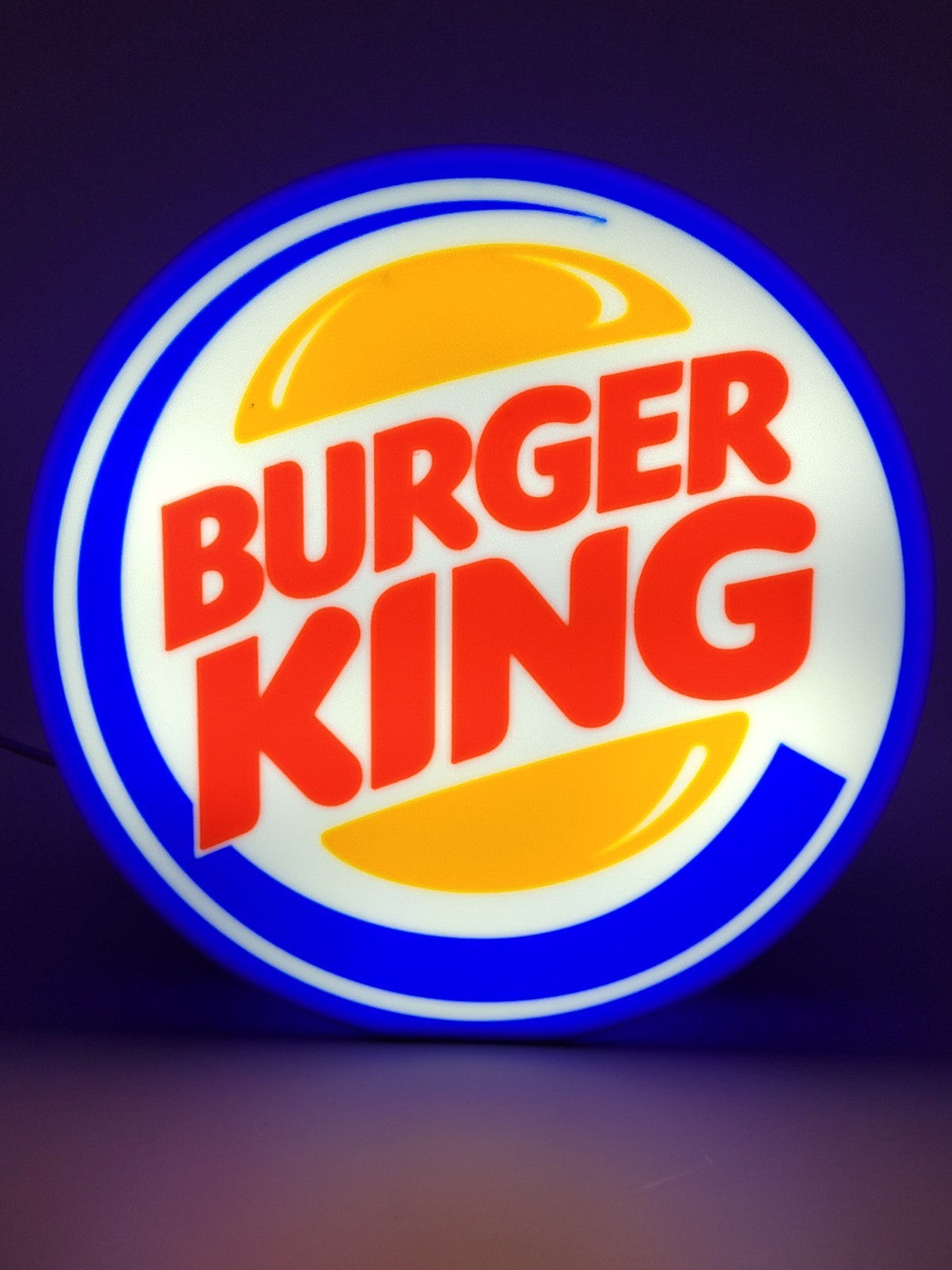 Burger King LED light sign with illuminated logo viewed from straight on
