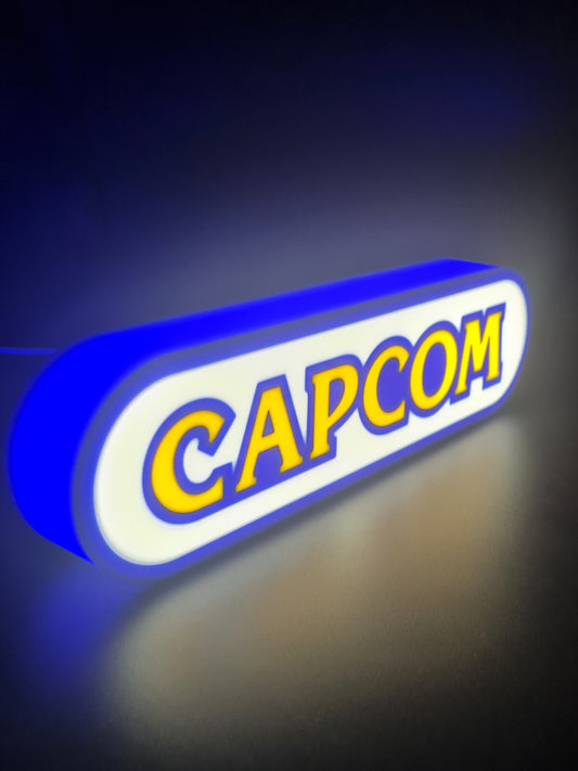 Capcom LED light sign with illuminated logo viewed from side view