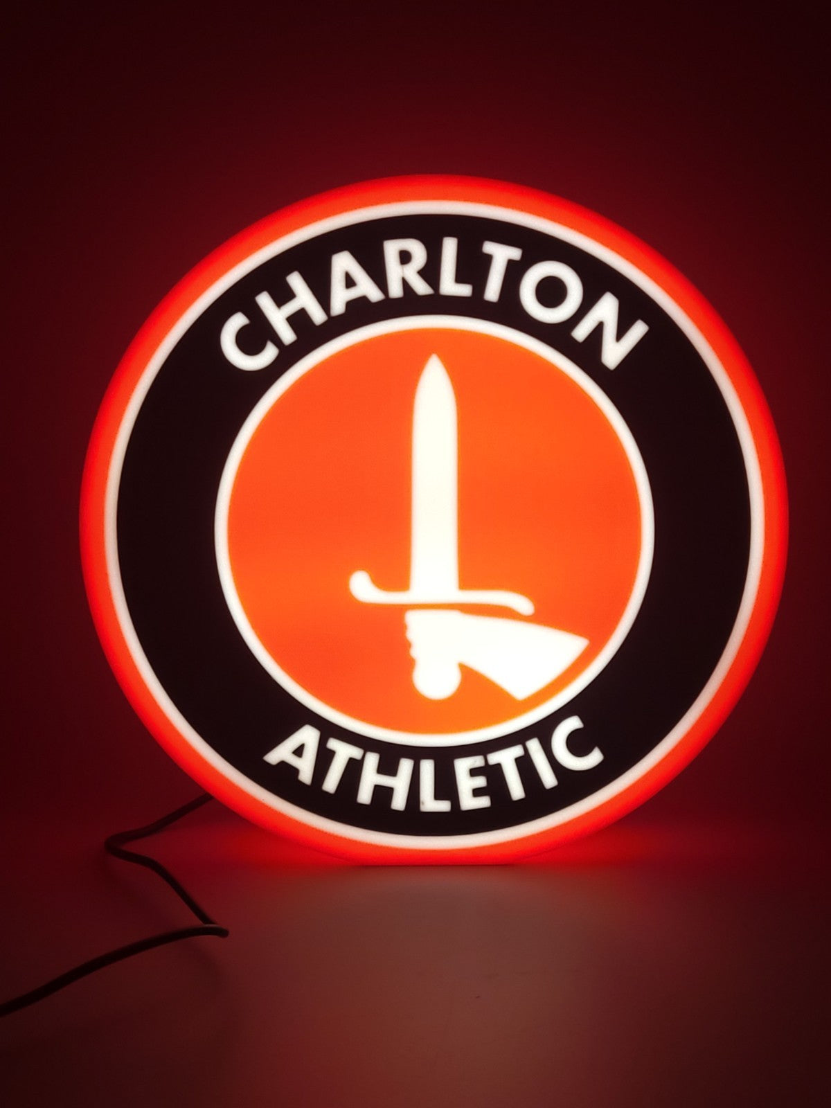 Carlton F.C. LED light sign with illuminated logo viewed from straight on