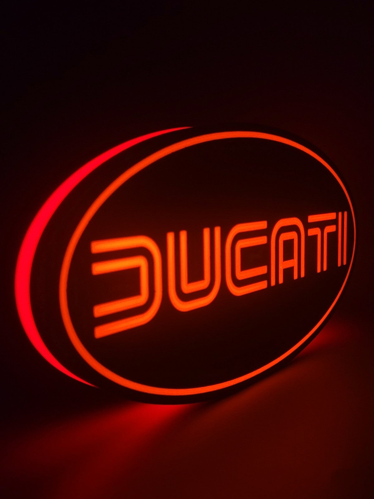 ducati LED light sign with illuminated logo viewed from side view