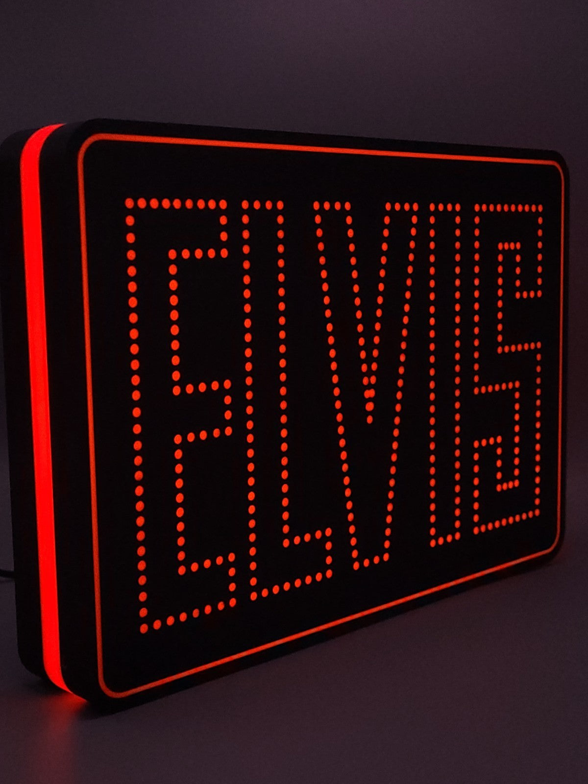 elvis led light sign with illuminated logo viewed from side view