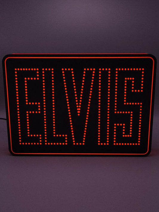 Elvis LED light sign with illuminated logo viewed from straight on