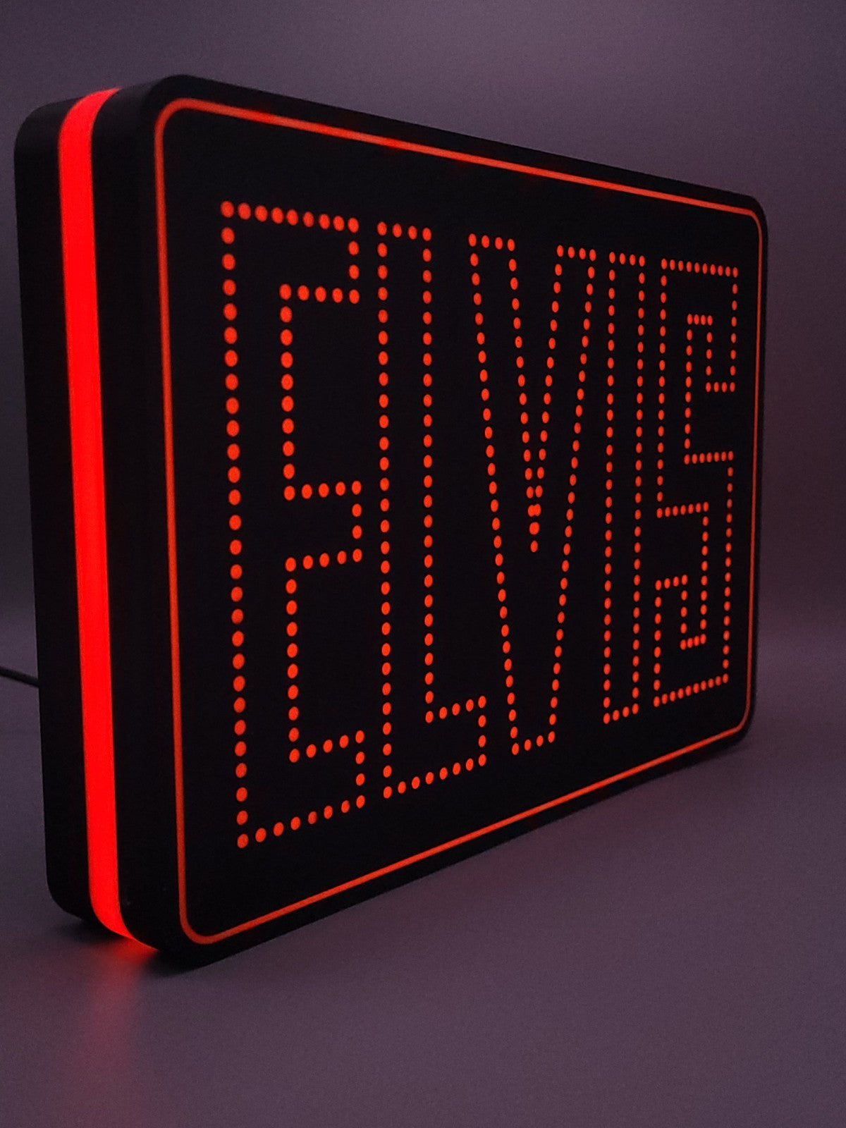 elvis led light sign with illuminated logo viewed from side view
