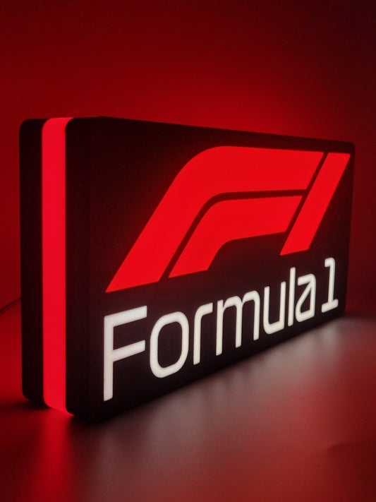 Formula 1 LED light sign with illuminated logo viewed from side view