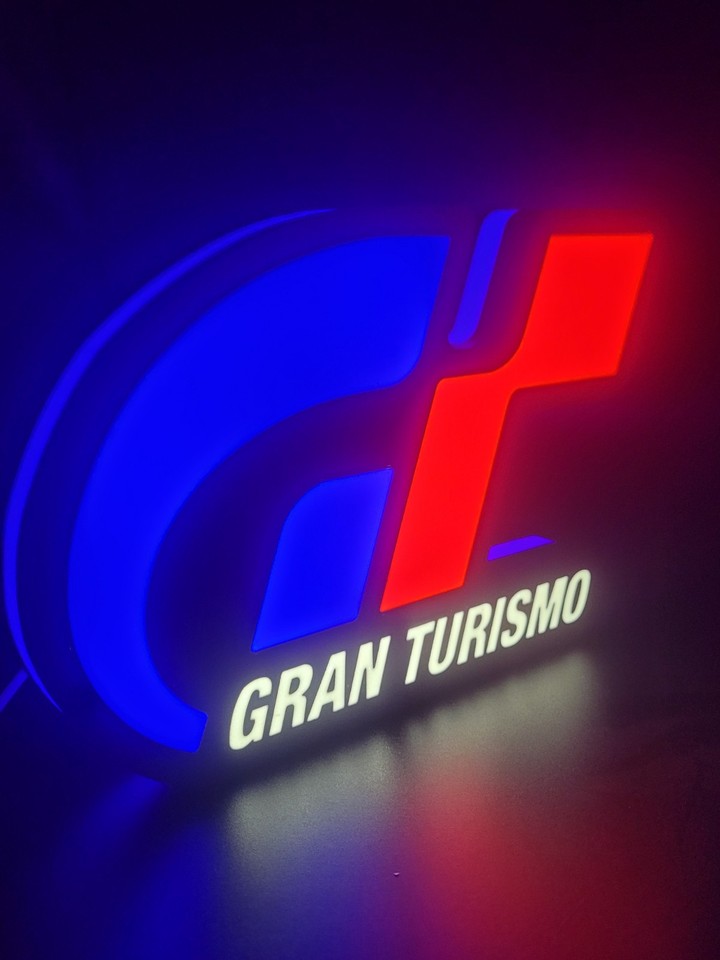 Gran Turismo LED light sign with illuminated logo viewed from side view