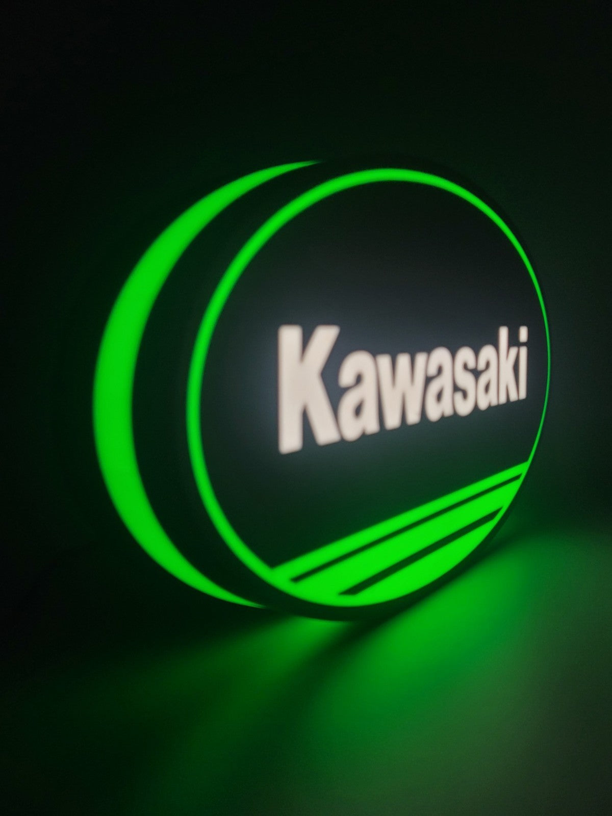 kawasaki LED light sign with illuminated logo viewed from side view