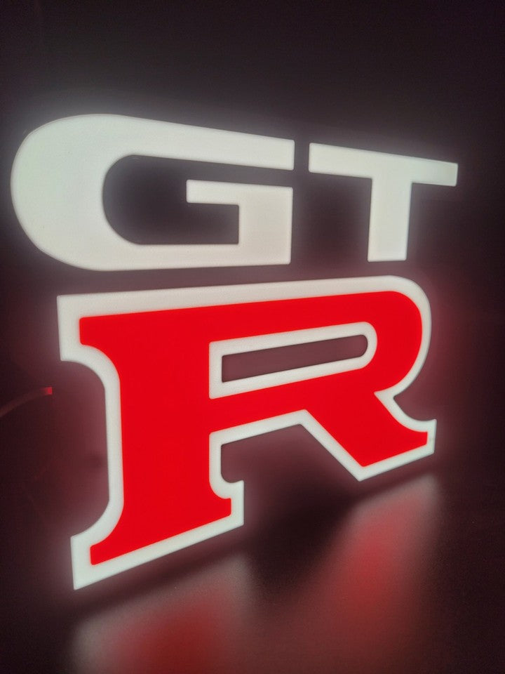 Nissan GTR LED light sign with illuminated logo viewed from side view