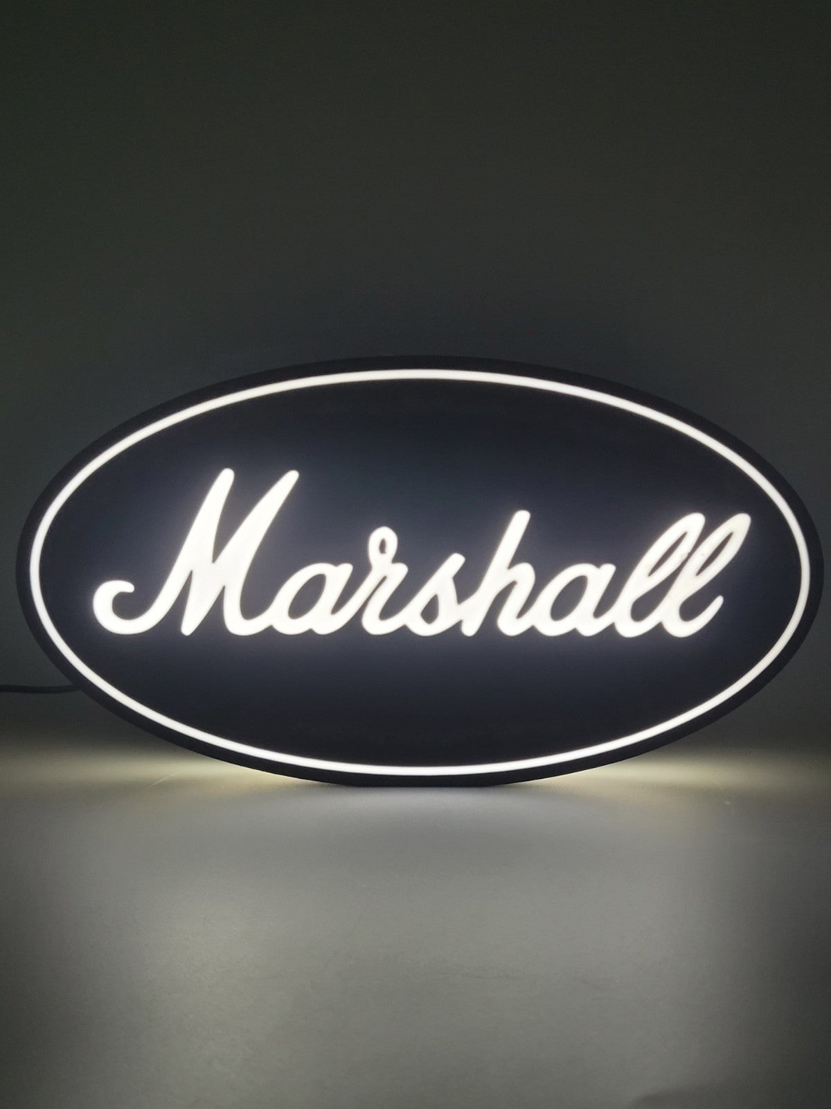 Marshall LED light sign with illuminated logo viewed from straight on