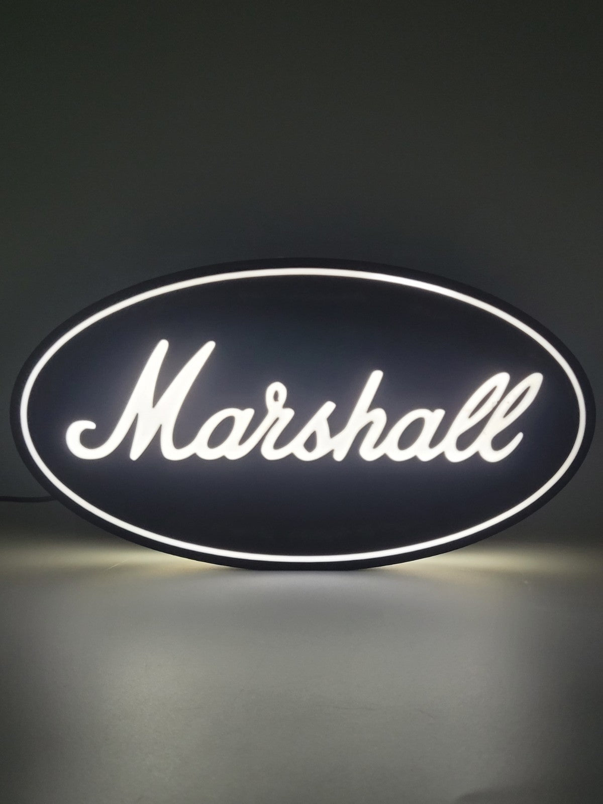 Marshall LED light sign with illuminated logo viewed from straight on