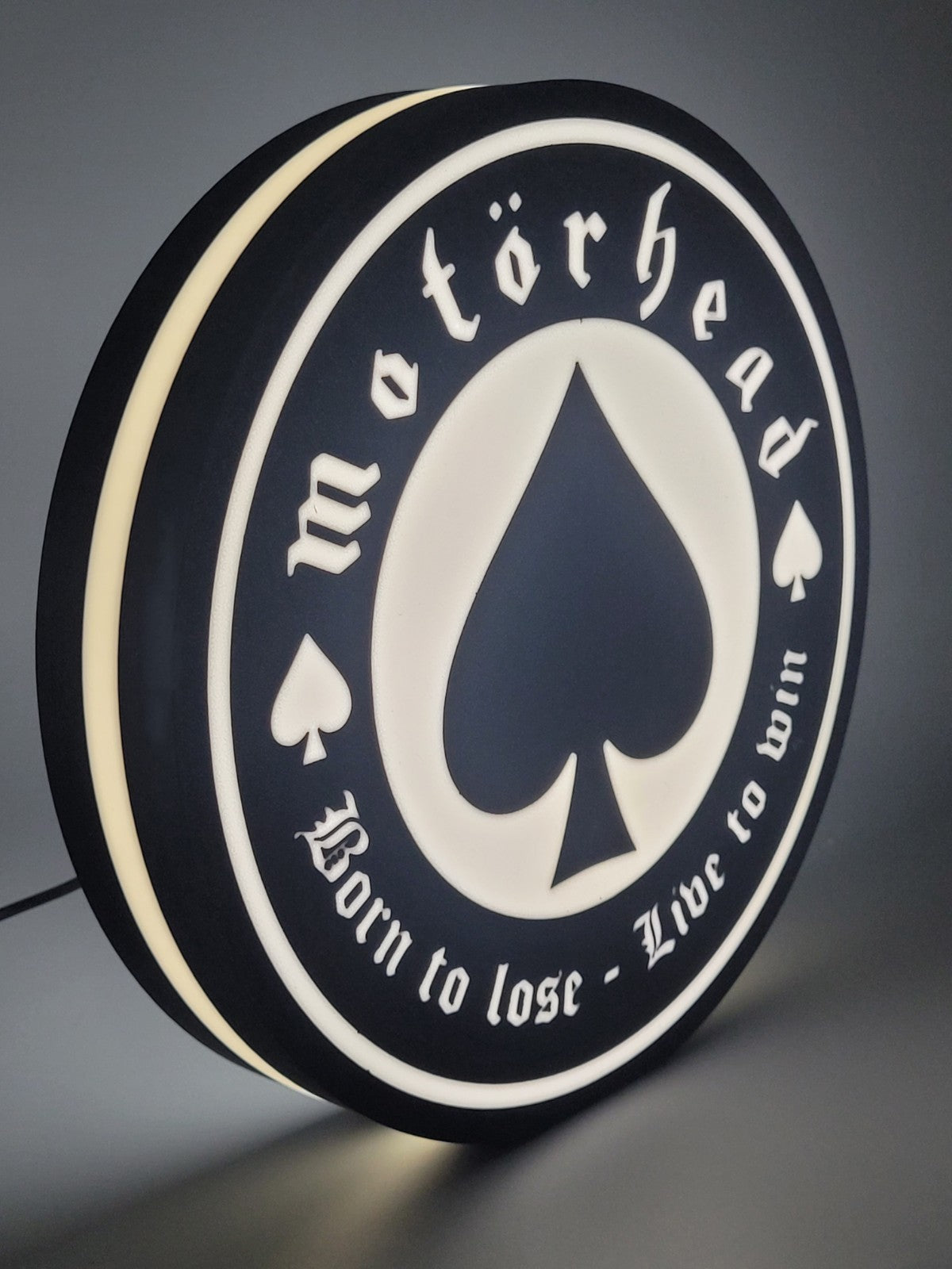 motorhead LED light sign with illuminated logo viewed from side view