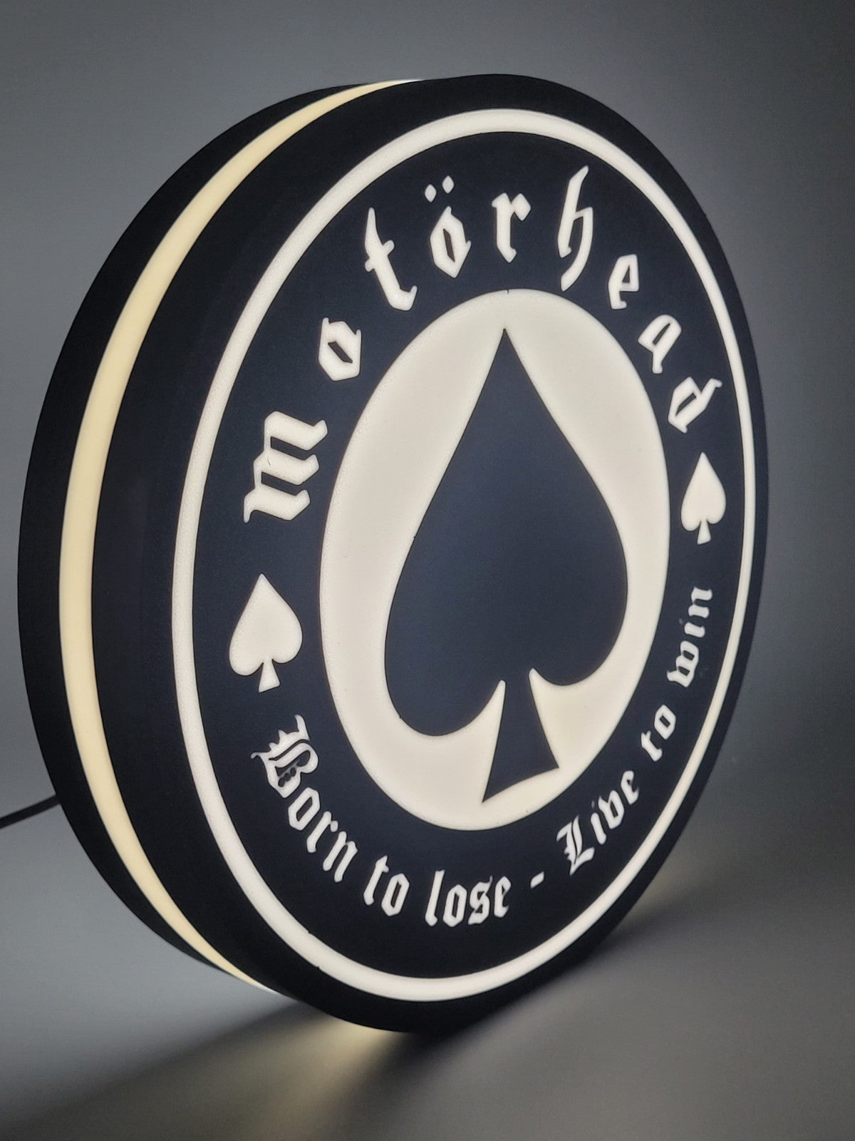 motorhead LED light sign with illuminated logo viewed from side view