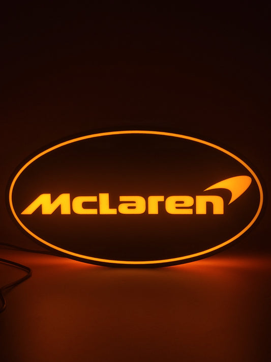 Mclaren LED light sign with illuminated logo viewed from straight on