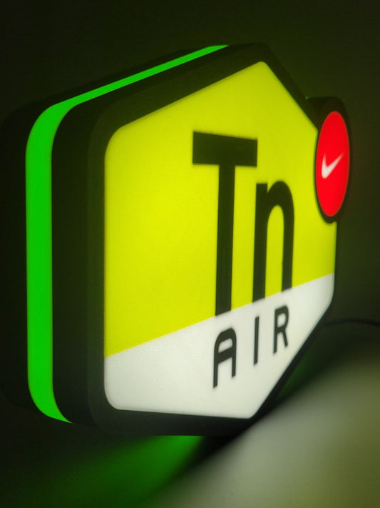 Nike TN LED light sign with illuminated logo viewed from side view