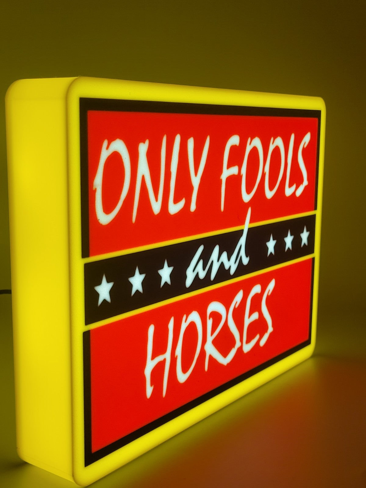 only fools and horses LED light sign with illuminated logo viewed from side view