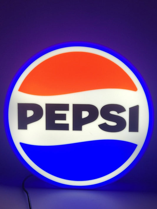 Pepsi LED light sign with illuminated logo viewed from straight on