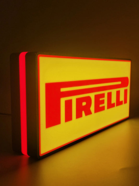 Pirelli LED light sign with illuminated logo viewed from side view