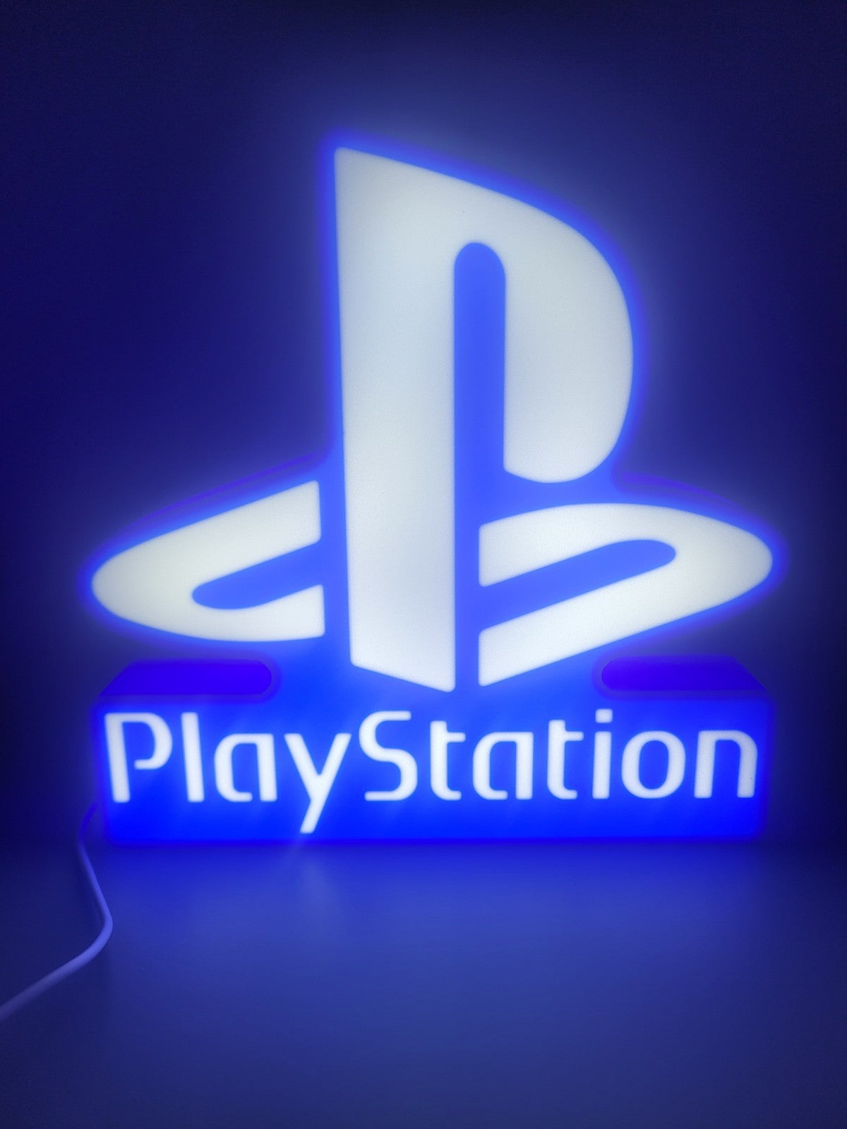 PLAYSTATION LED light sign with illuminated logo viewed from straight on