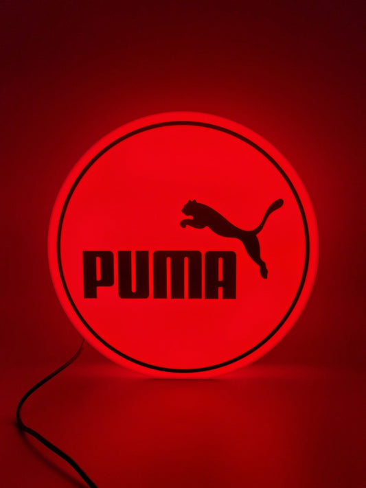 PUMA LED light sign with illuminated logo viewed from straight on