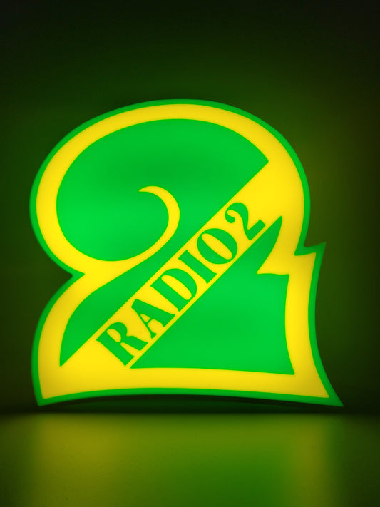 BBC radio 2 led light sign with illuminated logo viewed from straight on