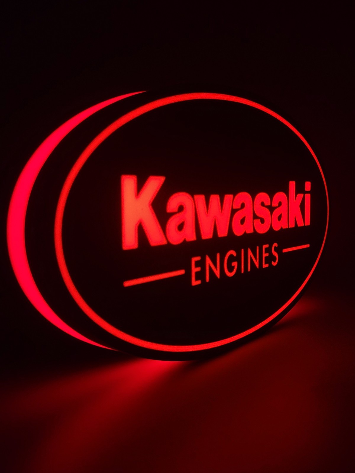 kawasaki LED light sign with illuminated logo viewed from side view