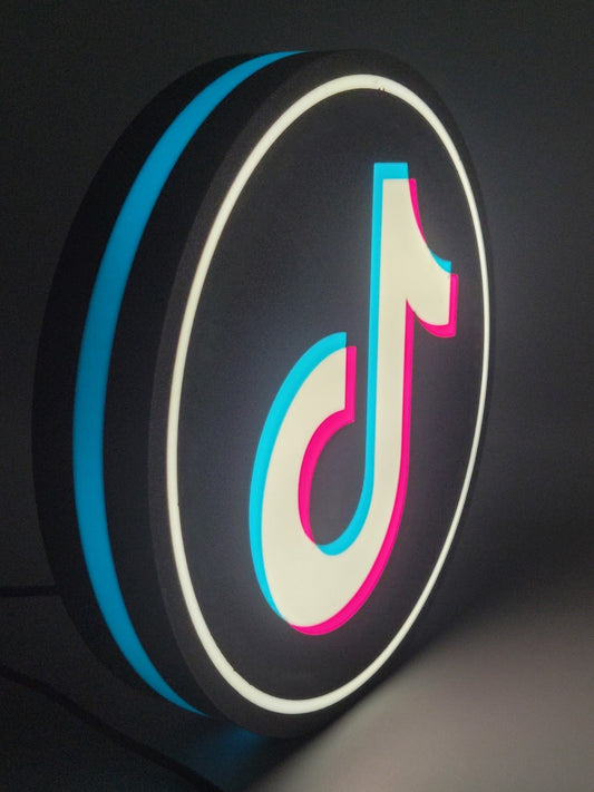 Tik Tok LED light sign with illuminated logo viewed from side view
