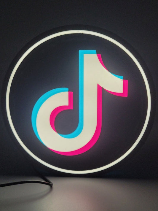 TIK TOK LED light sign with illuminated logo viewed from straight on