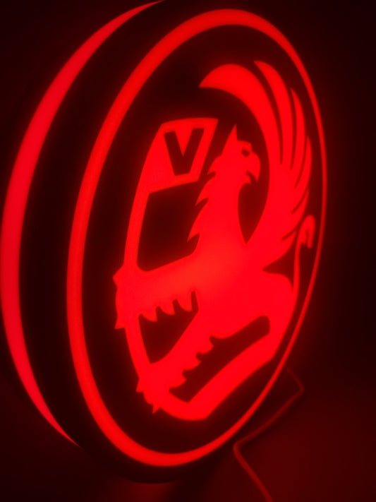 vauxhall LED light sign with illuminated logo viewed from side view