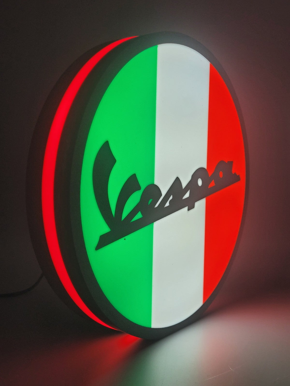 vespa led light sign with illuminated logo viewed from side view